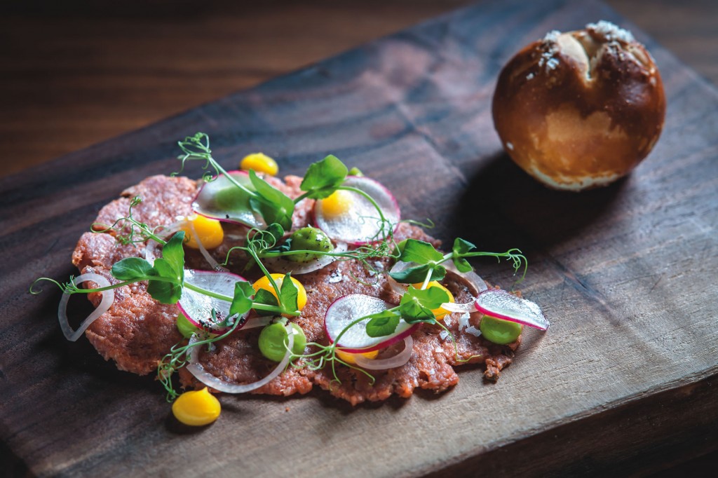 One of Hospoda’s dishes pairs beef tartare with Pilsner Urquell. 